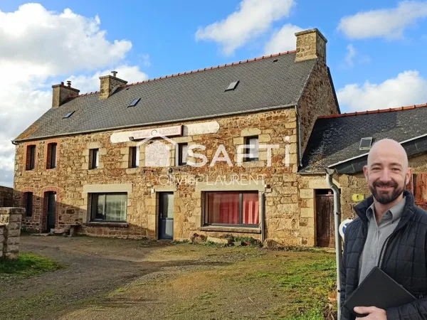 Grande maison de bourg en pierre
