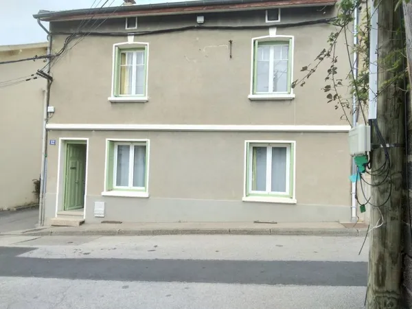 Immeuble de 154 m2 habitables comprenant 2 appartements.