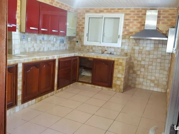 Maison sur le tampon