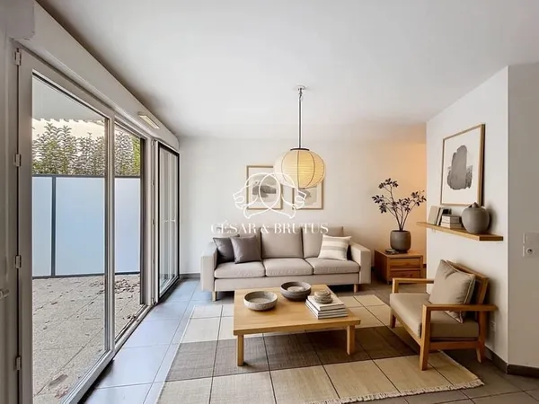 Beau 2 pièces en rez-de-jardin dans résidence récente de stan