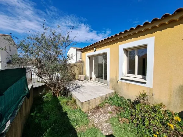 Maison proche centre avec jardinet et garage