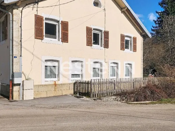 Maison spacieuse comprenant 2 appartements à vendre Les Gras - Un havre de paix au coeur de la natur