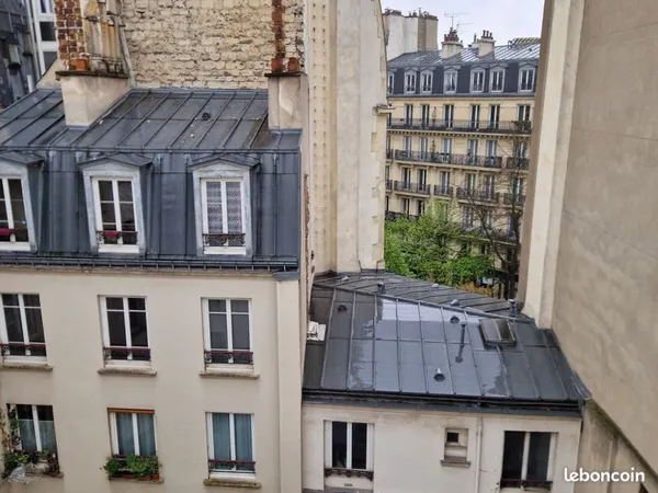Studio vue sur les toits parisiens
