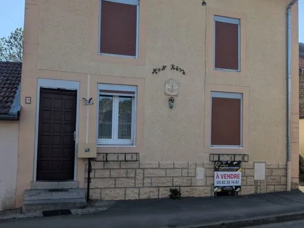Maison individuelle de 110 M2 avec jardin et garage.