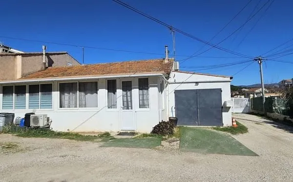 Maison De 80M² divisée en 2 appartements avec garage et cave