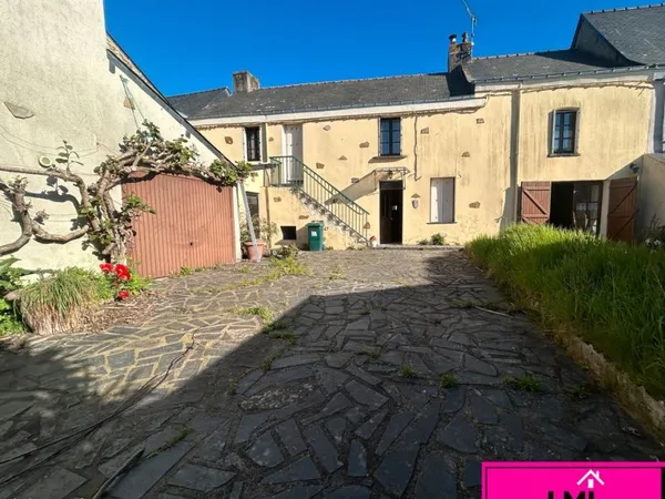 Maison avec un beau potentiel