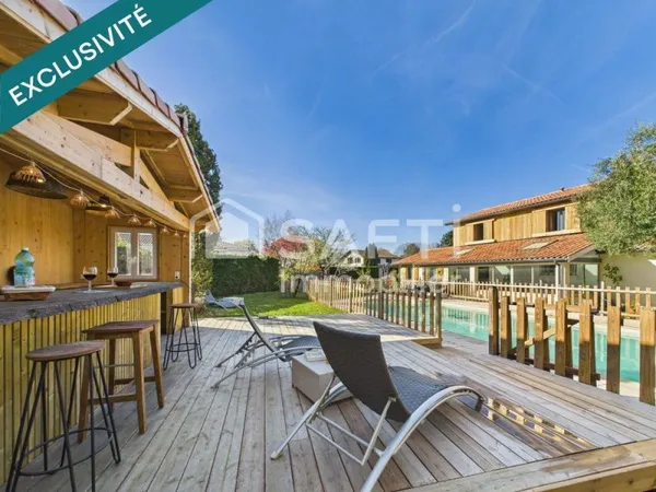 Maison familiale avec piscine et cuisine d'été