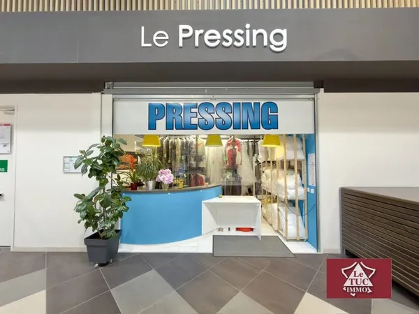 Pressing dans un hypermarché