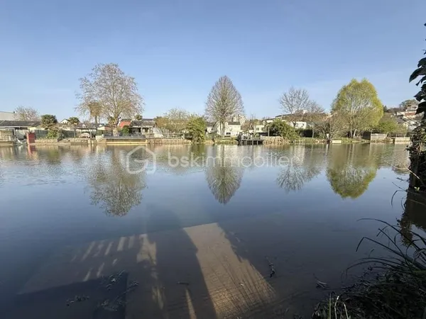 Terrain de loisir - avec chalet en bord de rivière ( eau et électricité ) - LE MANS