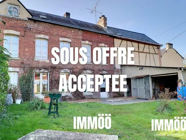Maison de ville à rénover avec jardin et garage