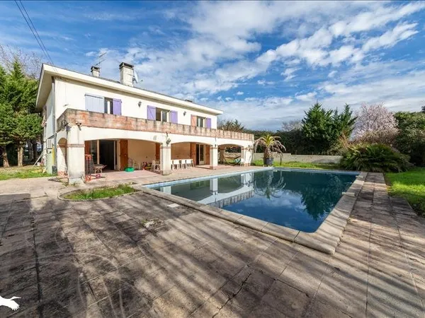 Maison 8 pièces 213 m²