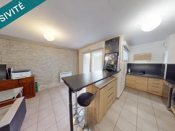 Rez-de-jardin 50 M² .A proximité des commerces