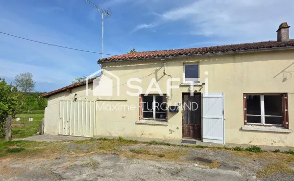 Longère 84 m², 2 chambres à rénover + garage et terrain.