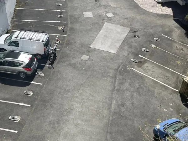 Place de parking plein centre