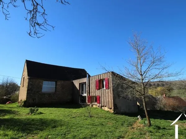 Grange avec maison et jardin attenant