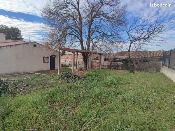Terrain 350m² avec bati