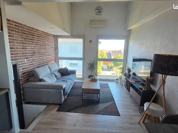 Duplex atypique avec parking au centre de schiltigheim