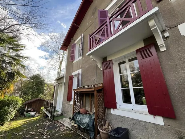 Maison avec jardin à quelques minutes à pied du centre-ville