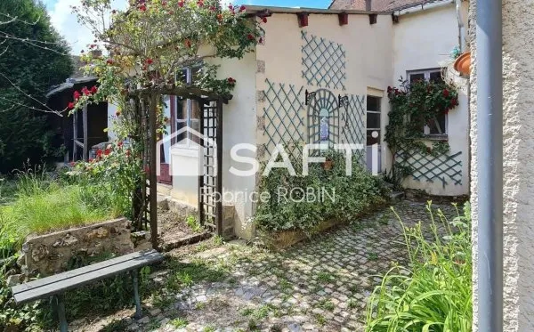Maison familiale et son jardin, au calme