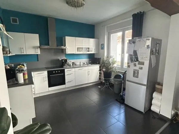 Charmante maison familiale avec jardin et combles aménagés