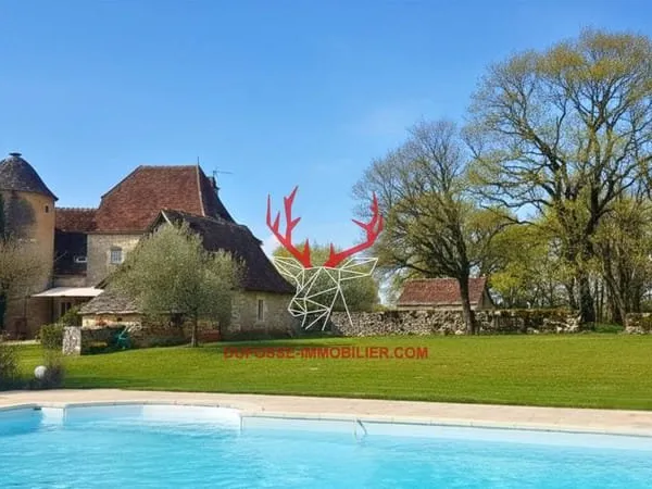Propriété de charme avec dépendances et 7 hectares dans le lot