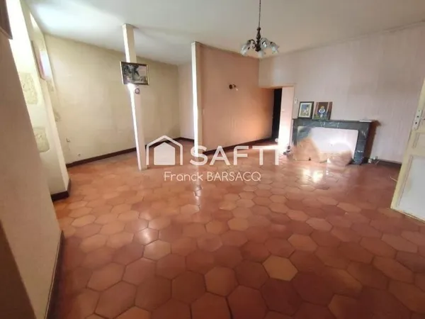 GRAND APPARTEMENT EN REZ DE CHAUSSEE AVEC JARDIN