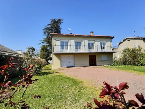 MAISON PROCHE DU CENTRE VILLE AVEC JARDIN ET GARAGE