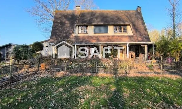 Maison traditionnelle avec grand terrain