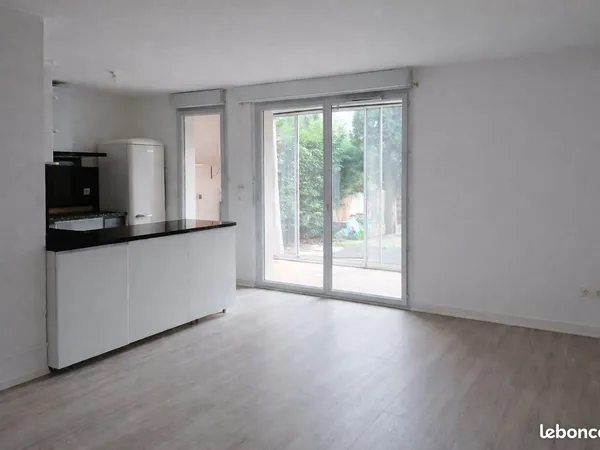 Appartement T2 avec jardin, véranda et parking
