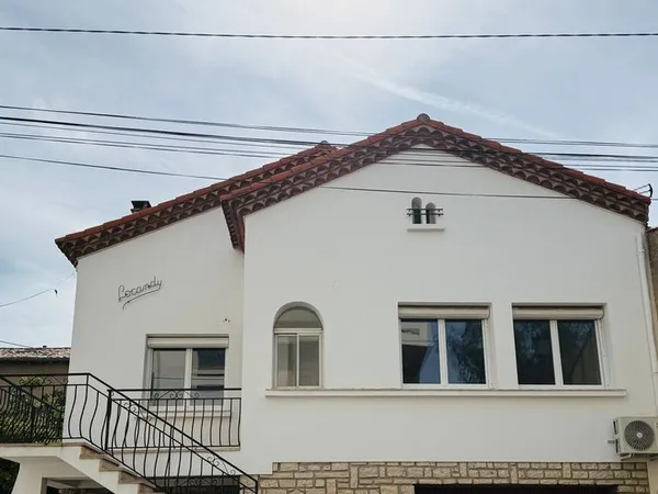 Maison 221 m² en centre-ville avec garage et jardin
