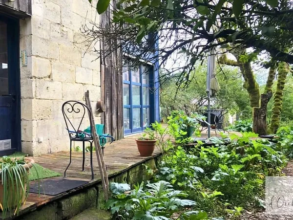 Echoppe 1900 de 204m2 avec 5 chambres et jardin à rénover