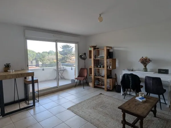 T2 46m² terrasse couverte 8m² parking sécurisé