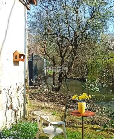 Maison de campagne à la ville