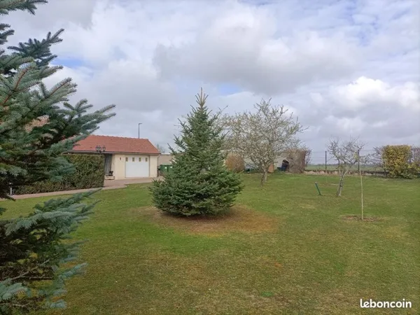 Terrain 700m² avec garage 32m²