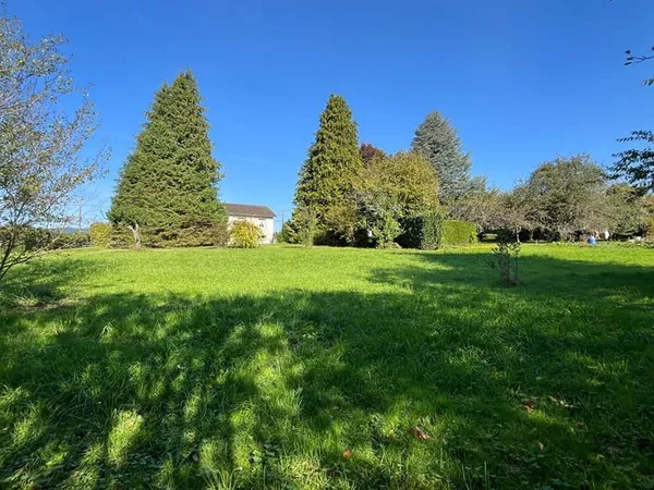 Maison 129m² avec 4 chambres, garage et jardin