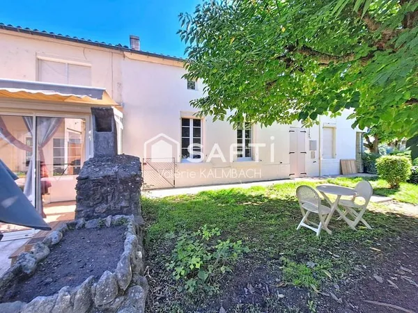 2 maisons attenantes - jardin - garages