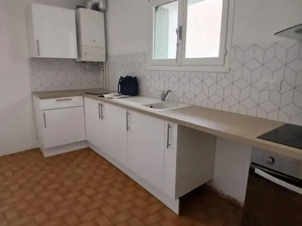 Vente appartement trois pièces en 1er étage/2 coeur de ville de Béziers