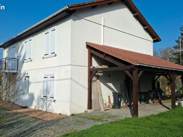 Vente de maison à deux appartements