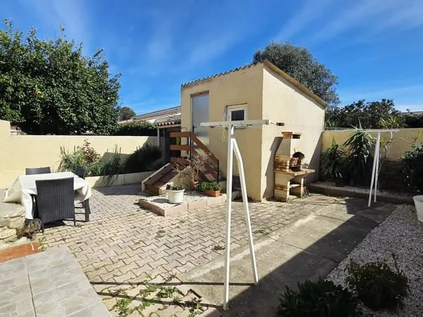Maison F5 avec jardin, garage et stationnements