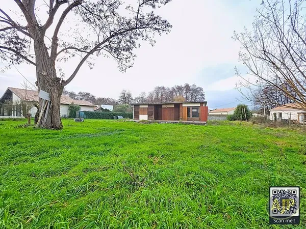 Terrain 1268 m² avec maison et garage à IZON