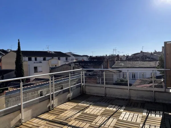 Triplex d'exception avec rooftop panoramique face au Jardin des