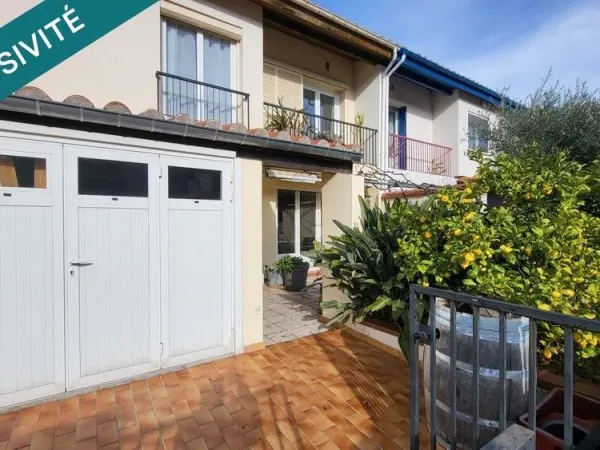 Jolie maison 2 faces avec garage et jardin