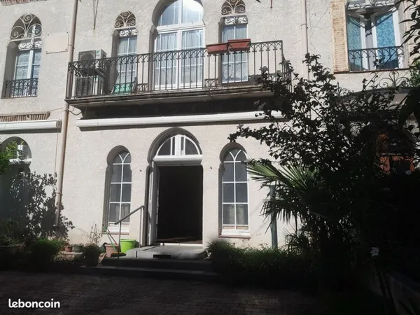 Vends appartement avec caves + jardin+ 2 places stationnement
