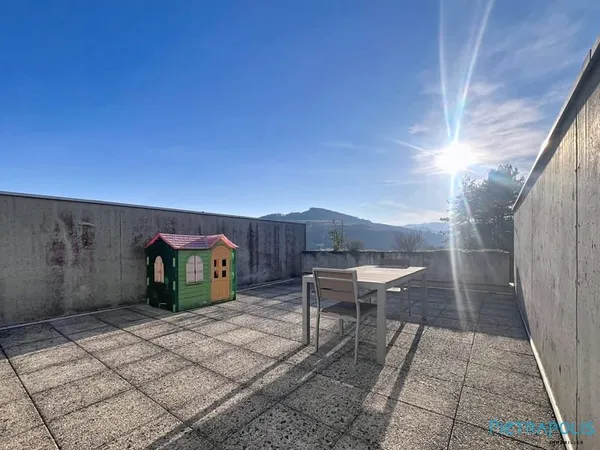 Duplex de type T4 avec grande terrasse, un garage et une place d