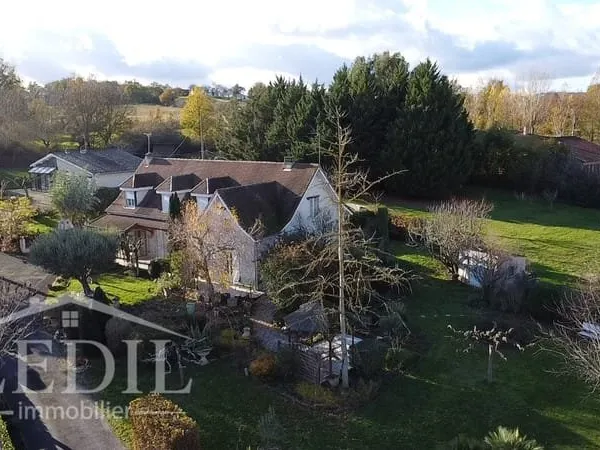Propriété rare avec parc, dépendance et garages