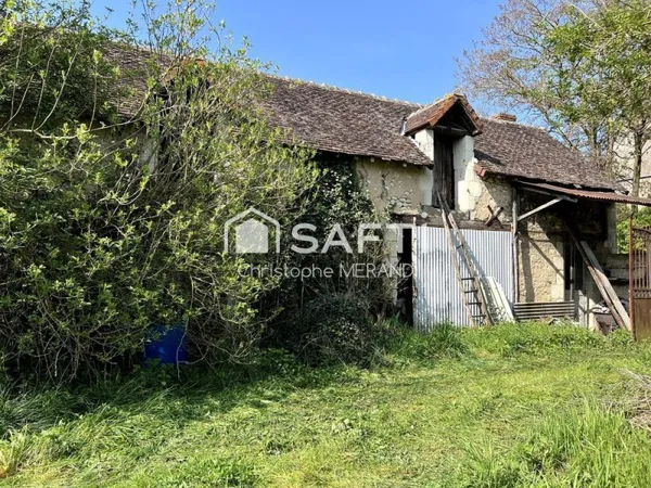 Anciene ferme dans le centre sur plus de 3000 m2