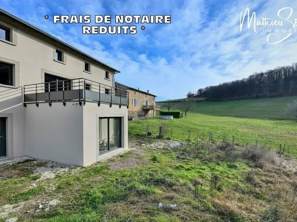 Sur les hauteurs de Thurins - Plateau de 100m² en duplex à aménager avec terrasse, 2 stationnements 