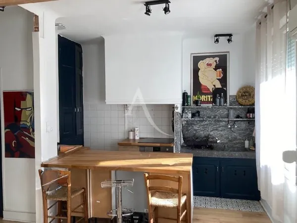 Maison de village 2 faces, avec garage en rdc sans extérieur de 58 m².