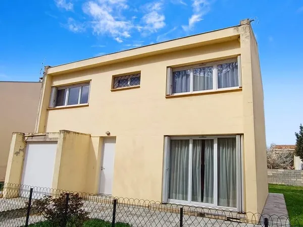 MAISON T5 de 112 M2 avec garage et jardin
