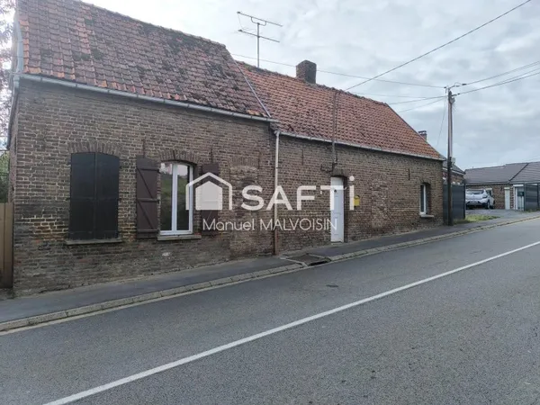 Maison à rénover avec beau potentiel - idéal pour projet familial ou investissement